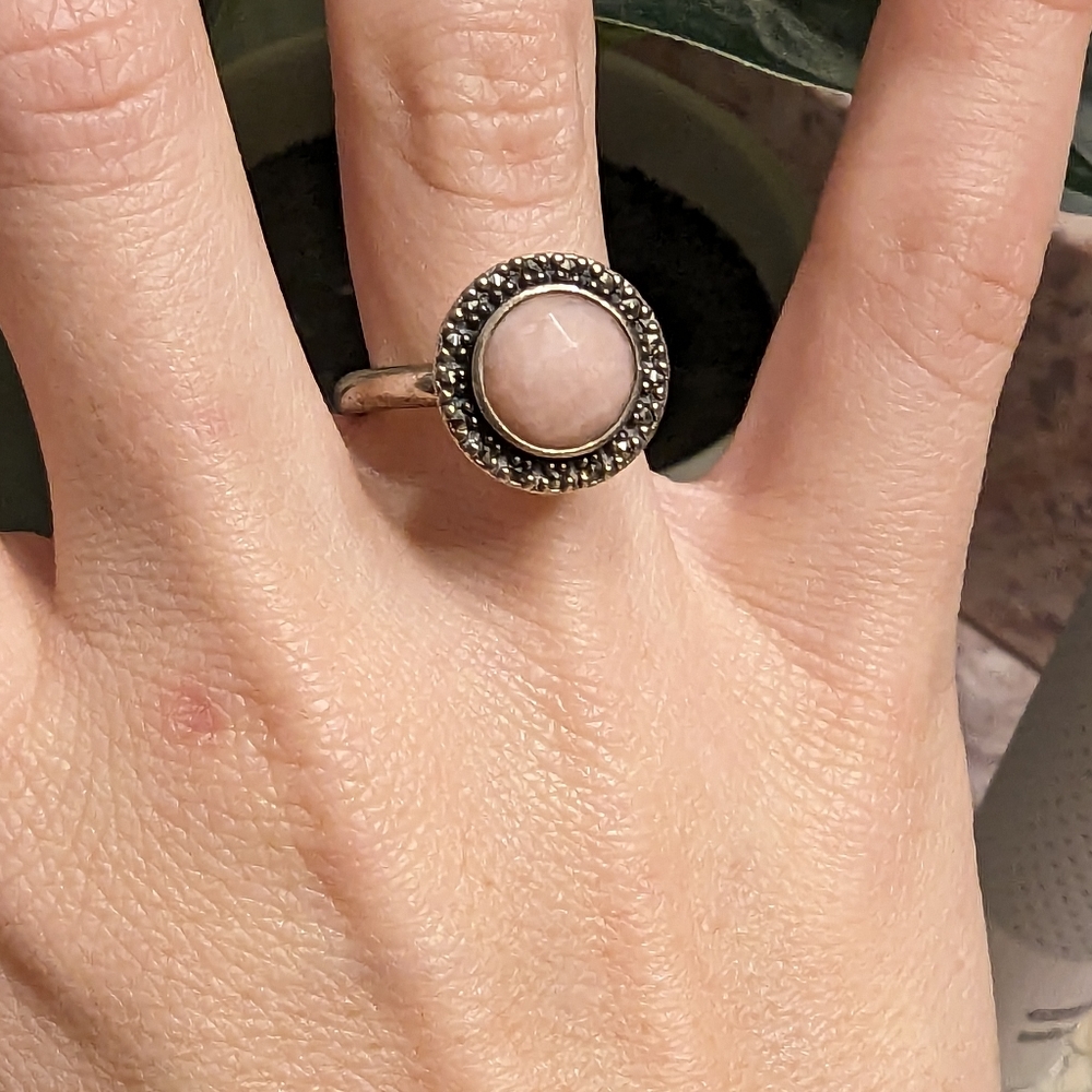 Sterling silver Pandora Ring with a pink stone. Gently used and very loved.